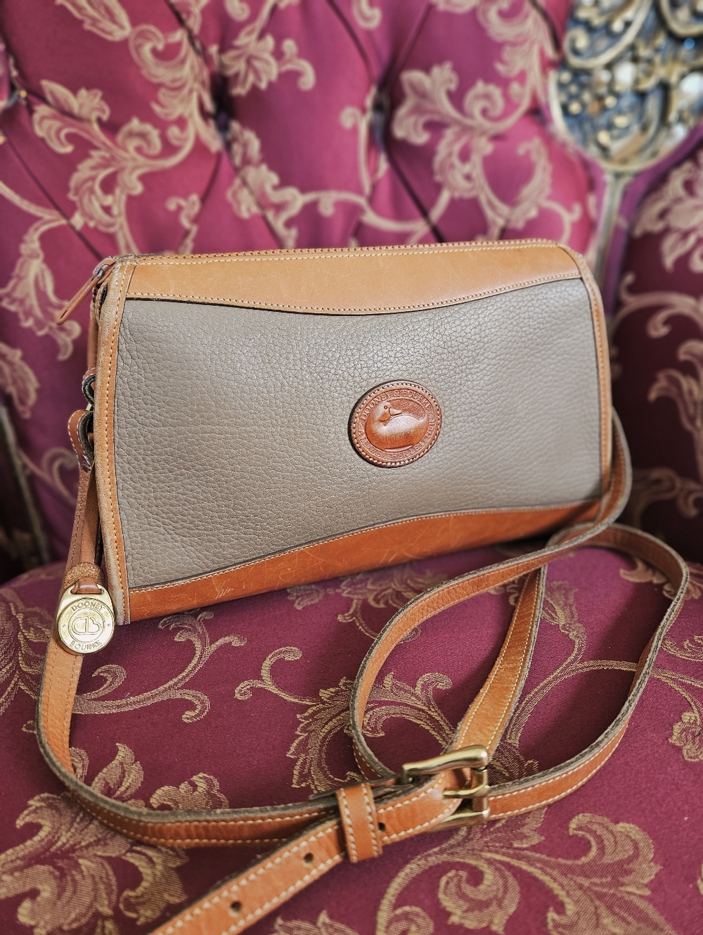 Vintage Dooney & Bourke All-Weather Leather crossbody bag.